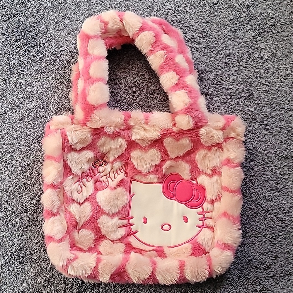 Hello Kitty Plush Shoulder Bag. NWOT. Pink with hearts all over 💖 .